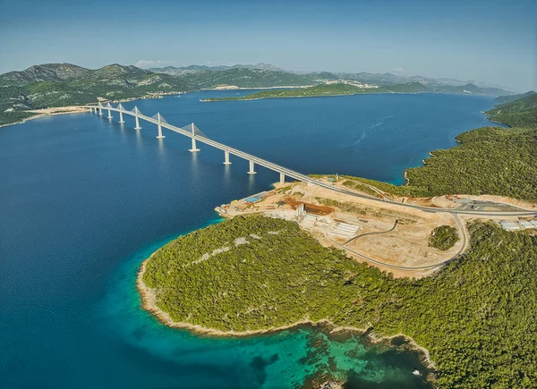 Long exposure aerial wide lens view of the Peljesac bridge, which connects the mainland with the peninsula, near Ston in Croatia