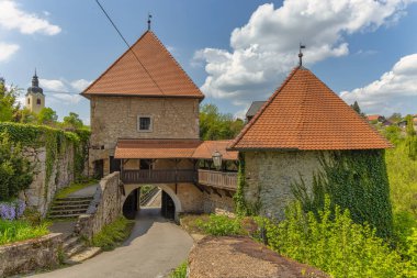 View of the entrance of the Old Castle and town Ozalj,built on a cliff over the Kupa river in 13th century