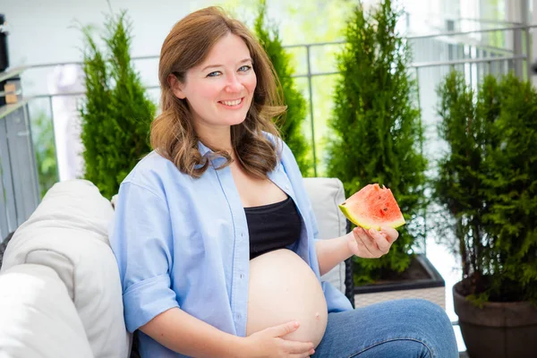 Young Pregnant Woman Eating Watermelon Balcony Home — Stok fotoğraf