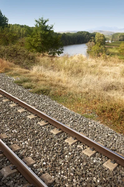 Rail road beside river — Stock Photo, Image