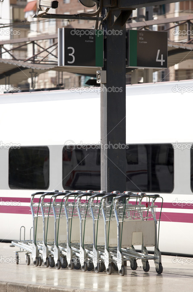 Lugage trolleys in a railway station