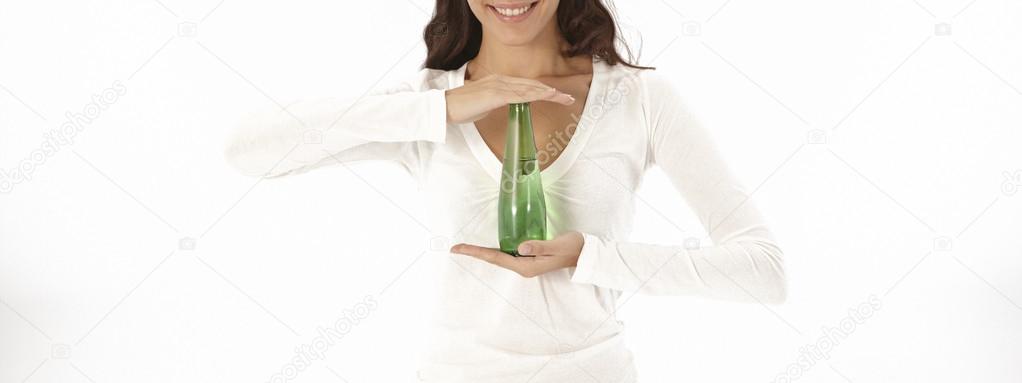 Young woman holding a bottle of water