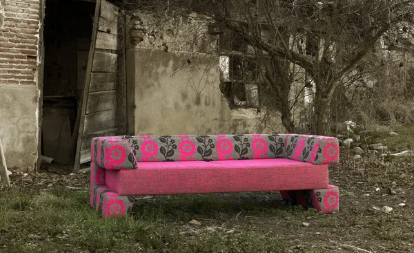 Sofa in abandoned rural place — Stock Photo, Image