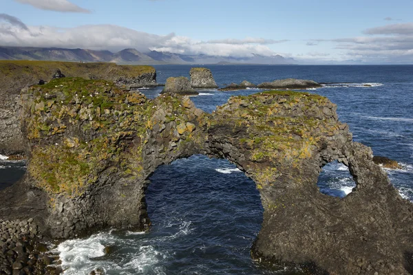 Iceland. Snaefellnes Peninsula. Basaltic rocks and North Atlanti — Stockfoto