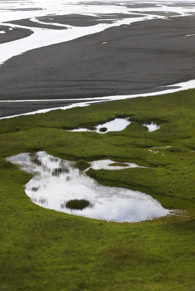 Iceland. Southeast area. Water and sand from glaciers. — Stock Photo, Image