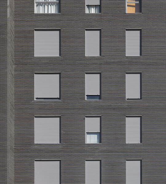 Modern bright aluminum building facade detail vertical
