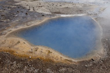 Iceland. South area. Golden Circle. Hot water hole nearby Geysyr clipart
