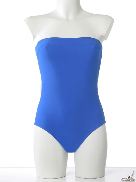 Female mannequin with swimwear and scissors. — Stock Photo, Image