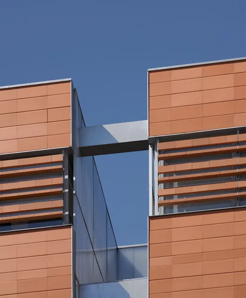 Ceramic building facade with metallic parts. — Stock Photo, Image