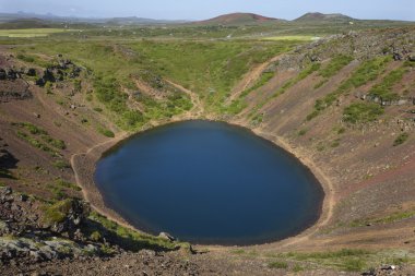 Iceland. South area. Golden Circle. Kerid crater filled with wat clipart