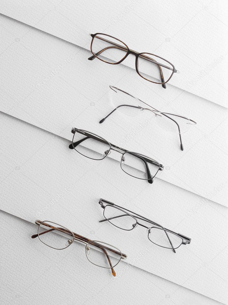 Vaious eyeglasses over a white background