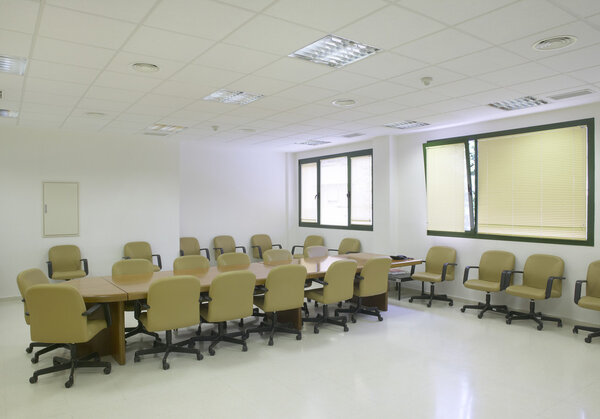 Conference room with white roof and chairs