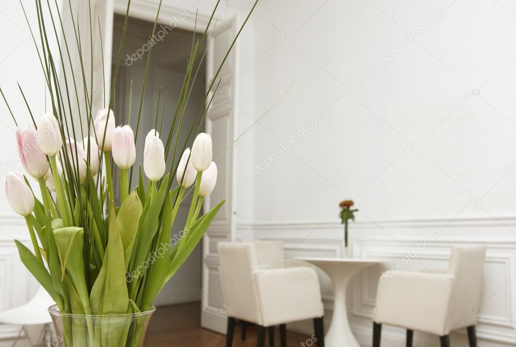 Flowers in a white room home interior