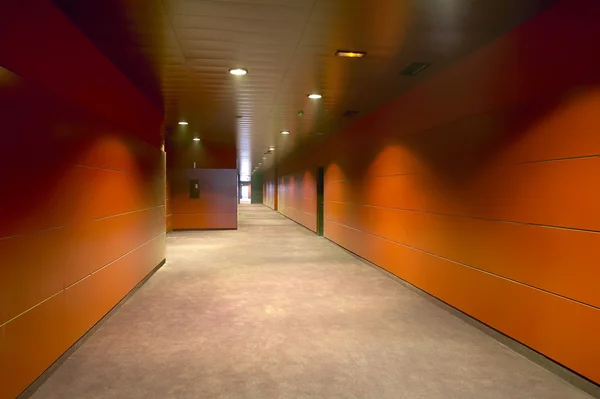 Modern building corridor in warm tones — Stock Photo, Image