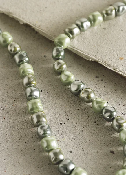 Necklace detail in green tones — Stock Photo, Image