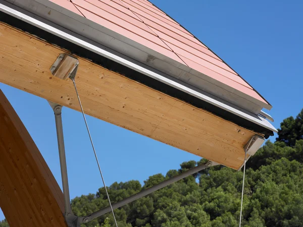 Building roof with ceramic and wooden parts — Stock Photo, Image