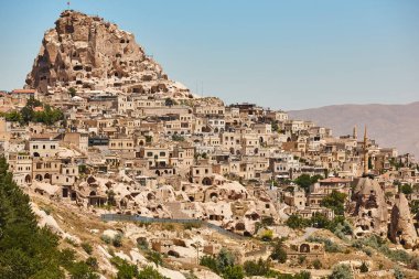 Usichar castle caved in rock. Cappadocia landmark in Turkey