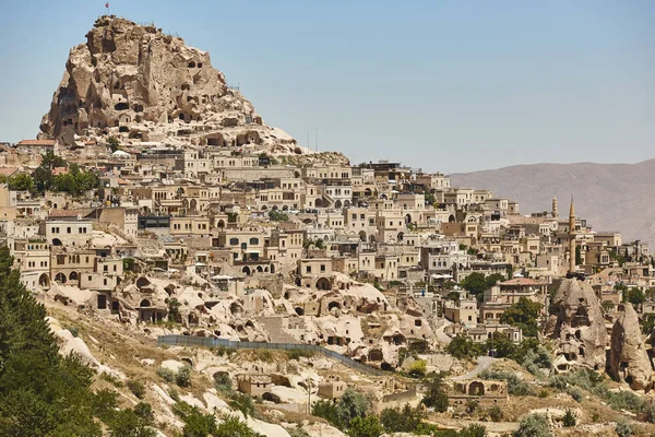 Usichar castle caved in rock. Cappadocia landmark in Turkey