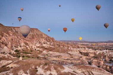 Balloons in rose valley, Cappadocia. Spectacular flight in Goreme. Turkey