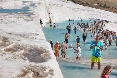 Pamukkale white mineral limestone natural pool. Tourism landmark in Turkey