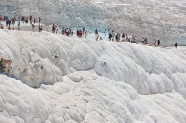 Pamukkale white mineral limestone natural pool. Tourism landmark in Turkey