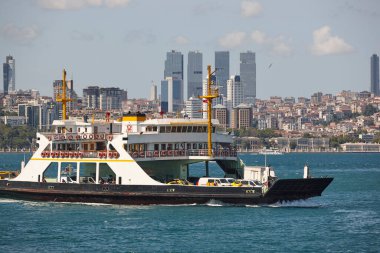 Comercial ferry traffic in the bosphorus strait. Istanbul cityscape. Turkey 