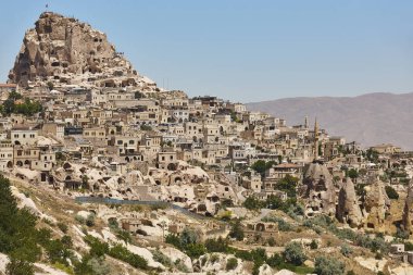 Usichar castle caved in rock. Cappadocia landmark in Turkey