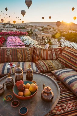 Balloons in rose valley, Cappadocia. Colorful sunrise in Goreme. Turkey