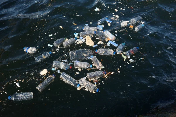 Plastic bottles in the sea. Garbage and pollution. Environmental issues