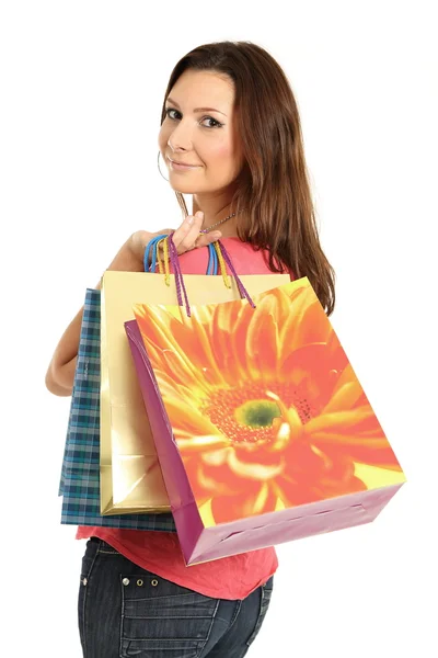 Szczęśliwa kobieta z torbami na zakupy i prezenty — Zdjęcie stockowe
