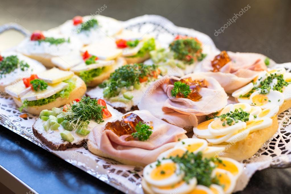 Sandwiches with cold cuts at a buffet