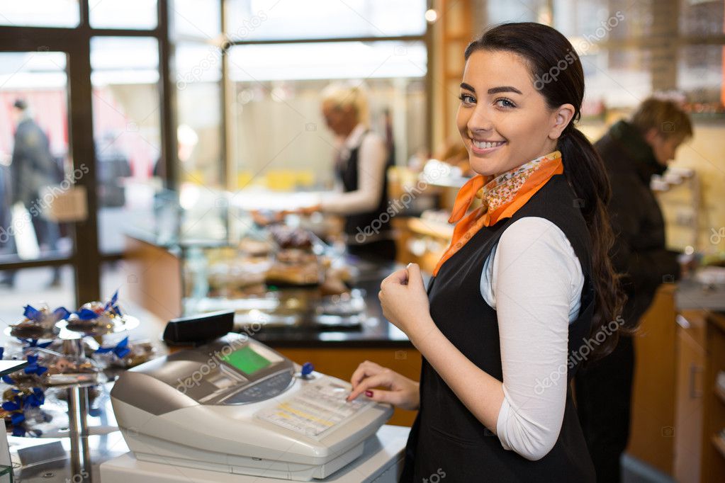 Salesperson at cash register