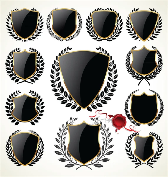 Black shield and laurel wreath collection — Stock Vector