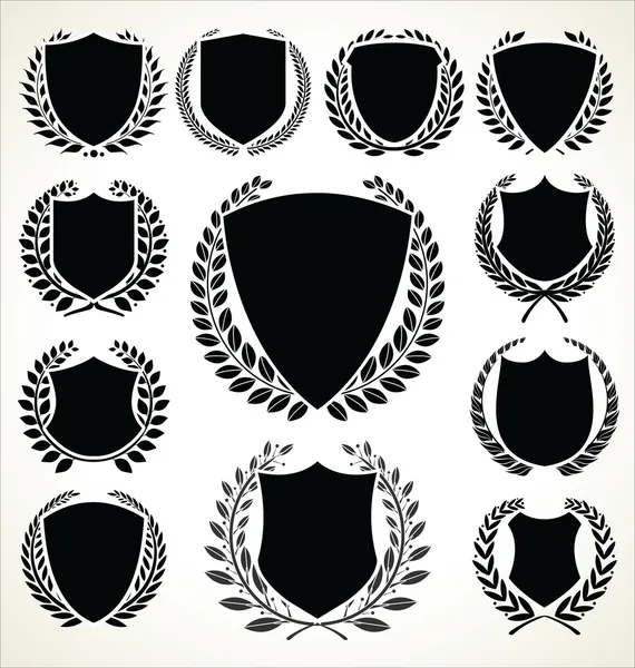 Black shield and laurel wreath collection — Stock Vector