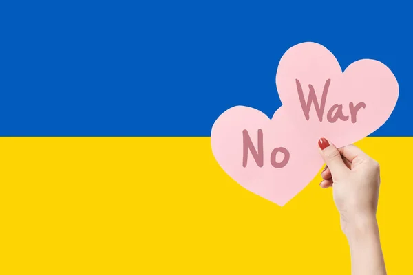 Women Hands Holding War Text Heart Shape Paper Ukraine Flag — Stok fotoğraf