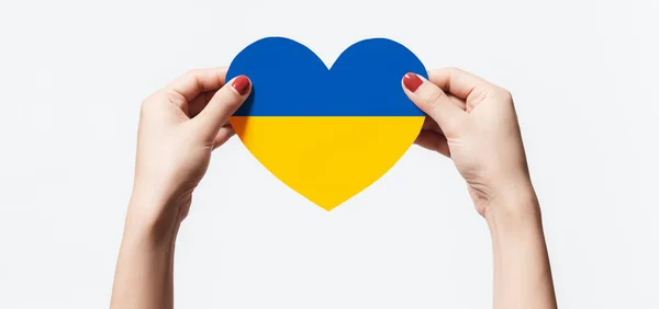 Women Hands Holding Ukraine Flag Color Heart Shape Paper White — ストック写真