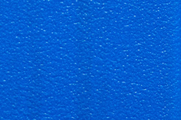 Close up of blue plastic texture pattern. Seamless background.