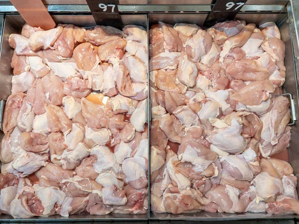 chicken meat from refrigerated section at supermarket
