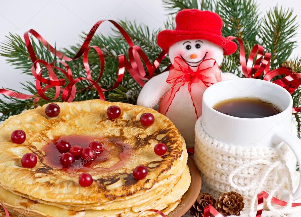 Christmas composition with pancakes and snowman