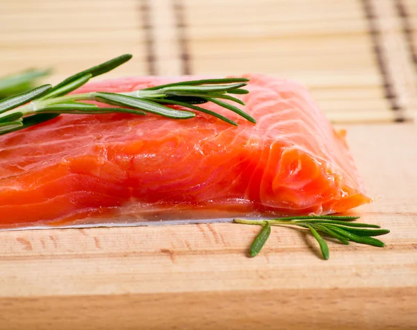 Salmon served with rosemary — Stock Photo, Image