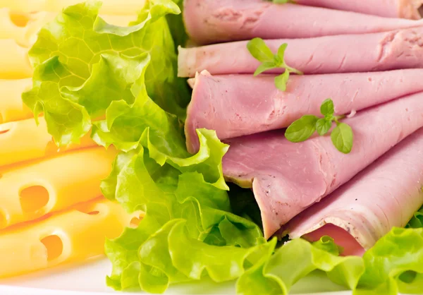 Cheese with pork and lettuce — Stock Photo, Image