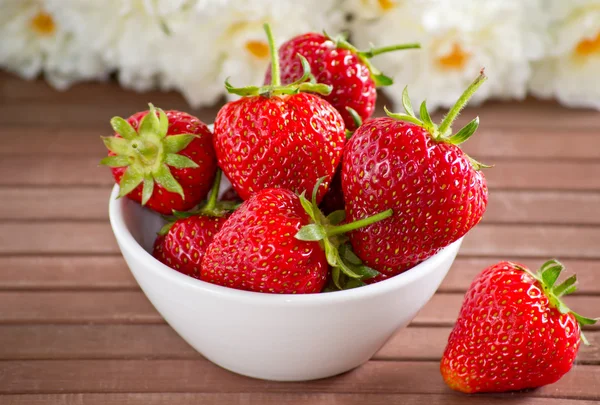 Strawberries in the white bowl — Stock Photo, Image