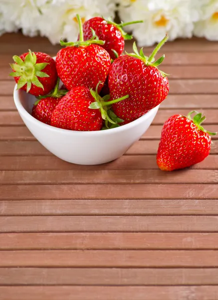 Strawberries in the white bowl — Stock Photo, Image