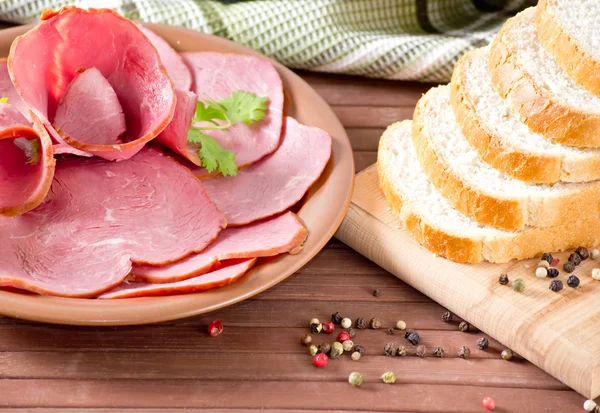 Pork, bread and spices — Stock Photo, Image