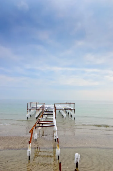 Sea with broken pier — Stock Photo, Image