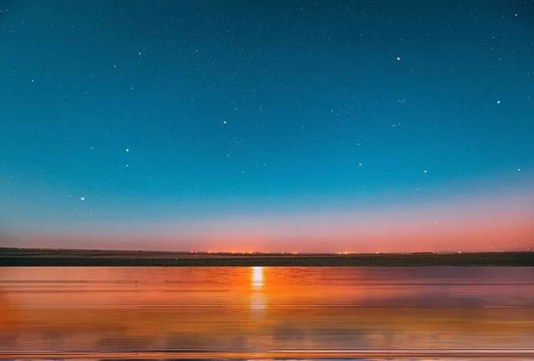 Blue Bright Starry Sky Pink Yellow Sunset Sea Water Vawe — Foto de Stock