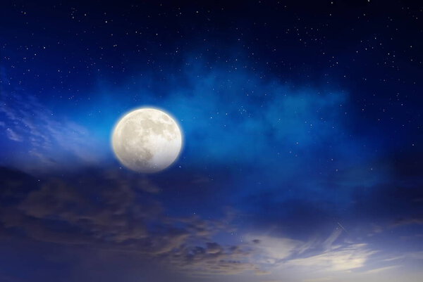Bright moon at cloudy blue sky atmosphere background weather forecast