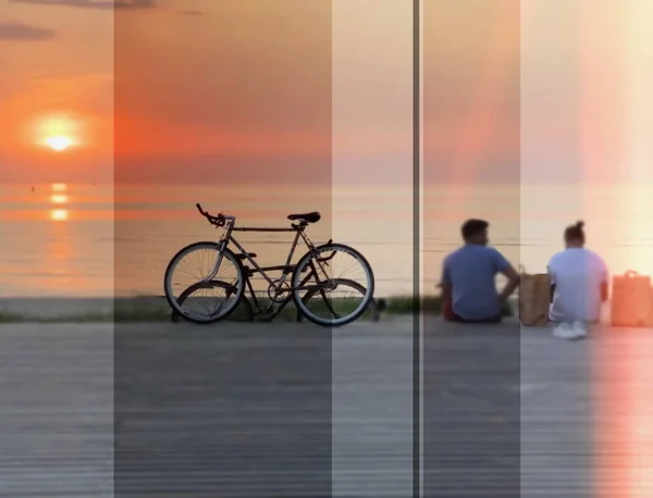 Men Bike Walk Promenade Watching Orange Sunset Sea Reflection Buildin — Stockfoto