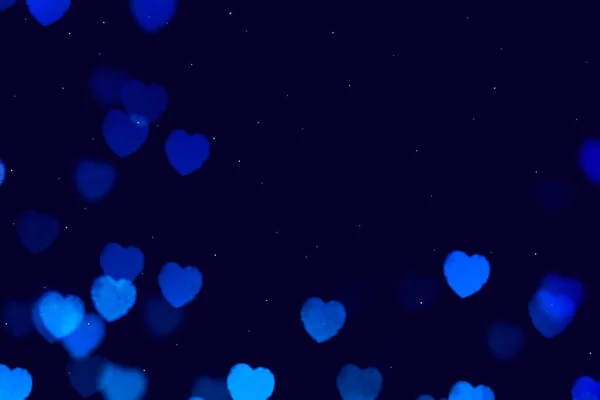 Bokeh Εορταστική Leack Μπλε Σύμβολο Της Καρδιάς Σκούρο Φόντο — Φωτογραφία Αρχείου