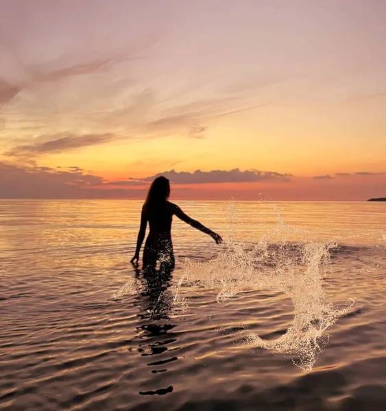 Water Splash Young Woman Silhouette Orange Sunset Sea Water Wave — Stock Photo, Image